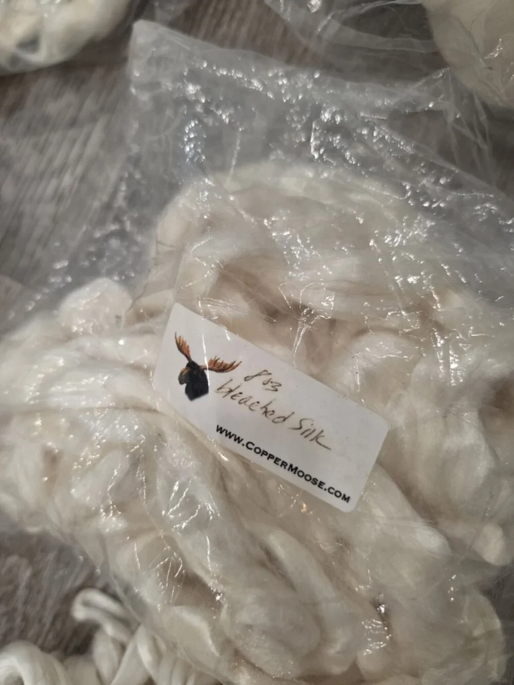 Assorted lot of wool, angora, silk felting fibers and yard raw and rolled colors